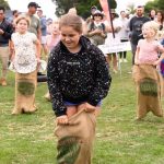 Kids racing the sack race at the Thorpdale Potato Festival