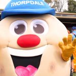 Thorpdale Potato Festival mascot playing with kids at the festival